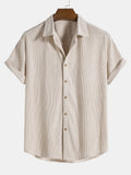 Camisa de algodón con botones y mangas cortas